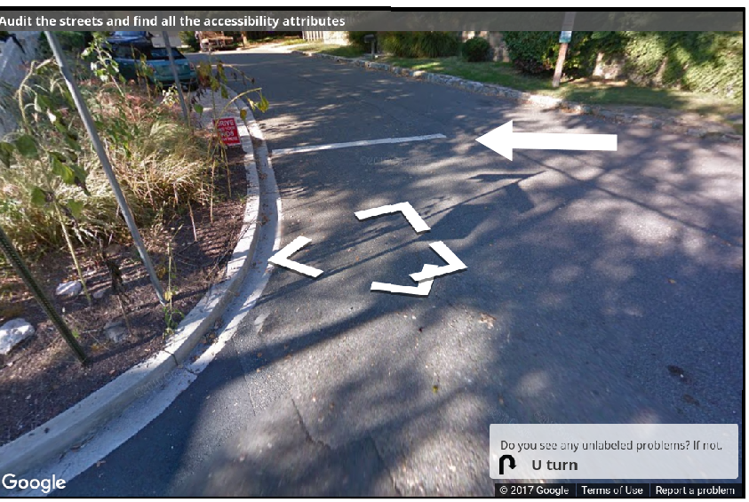 A Street View image of a street with a stop line