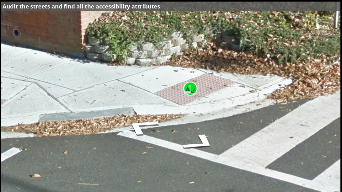 A Street View image of a curb ramp with poor landing space