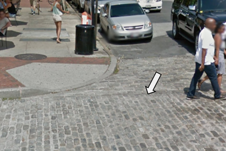 Cobblestone sidewalks and crosswalks.