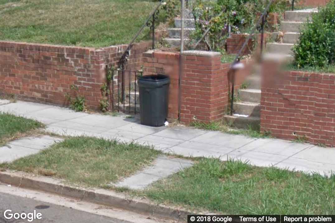 A Street View image of objects that are not obstacles, such as a trash can