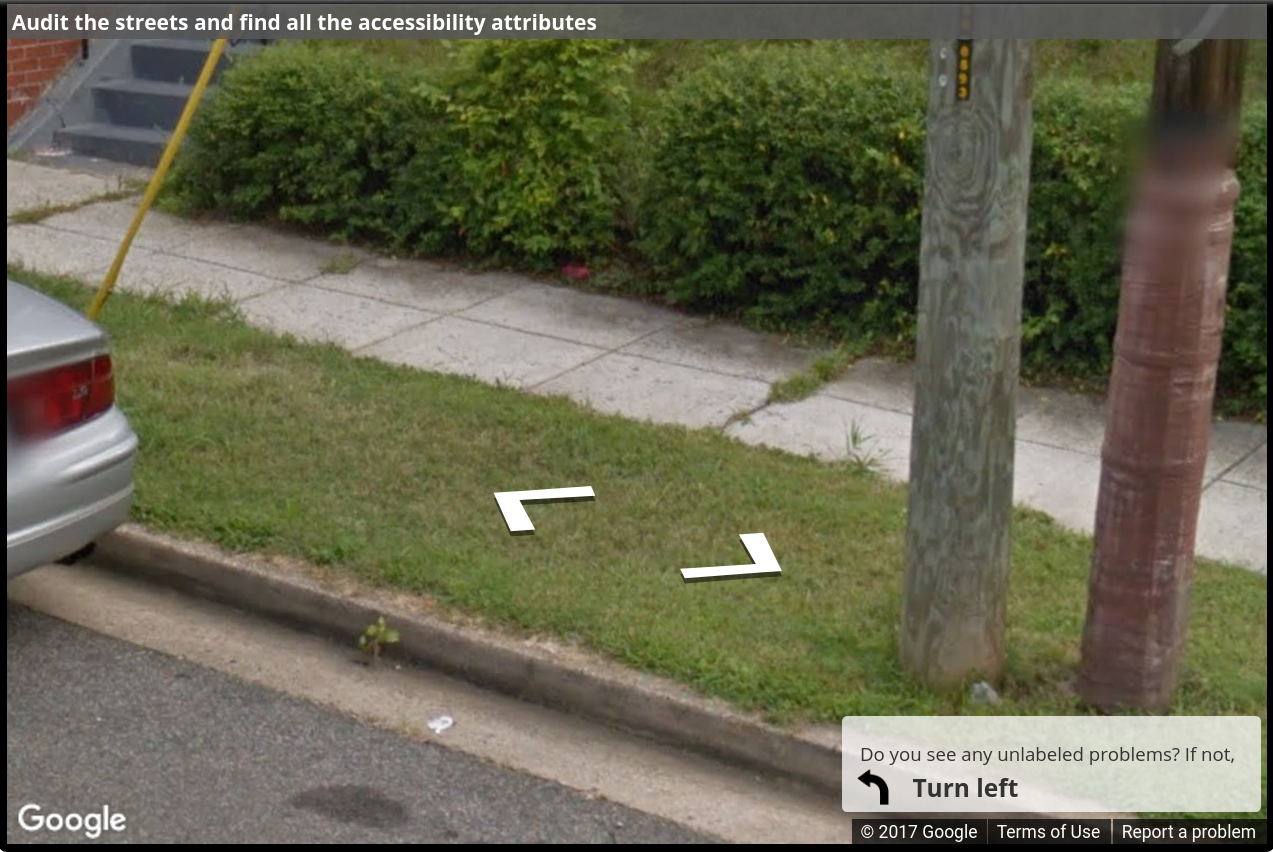 A Street View image of a sidewalk with grass between sidewalk blocks